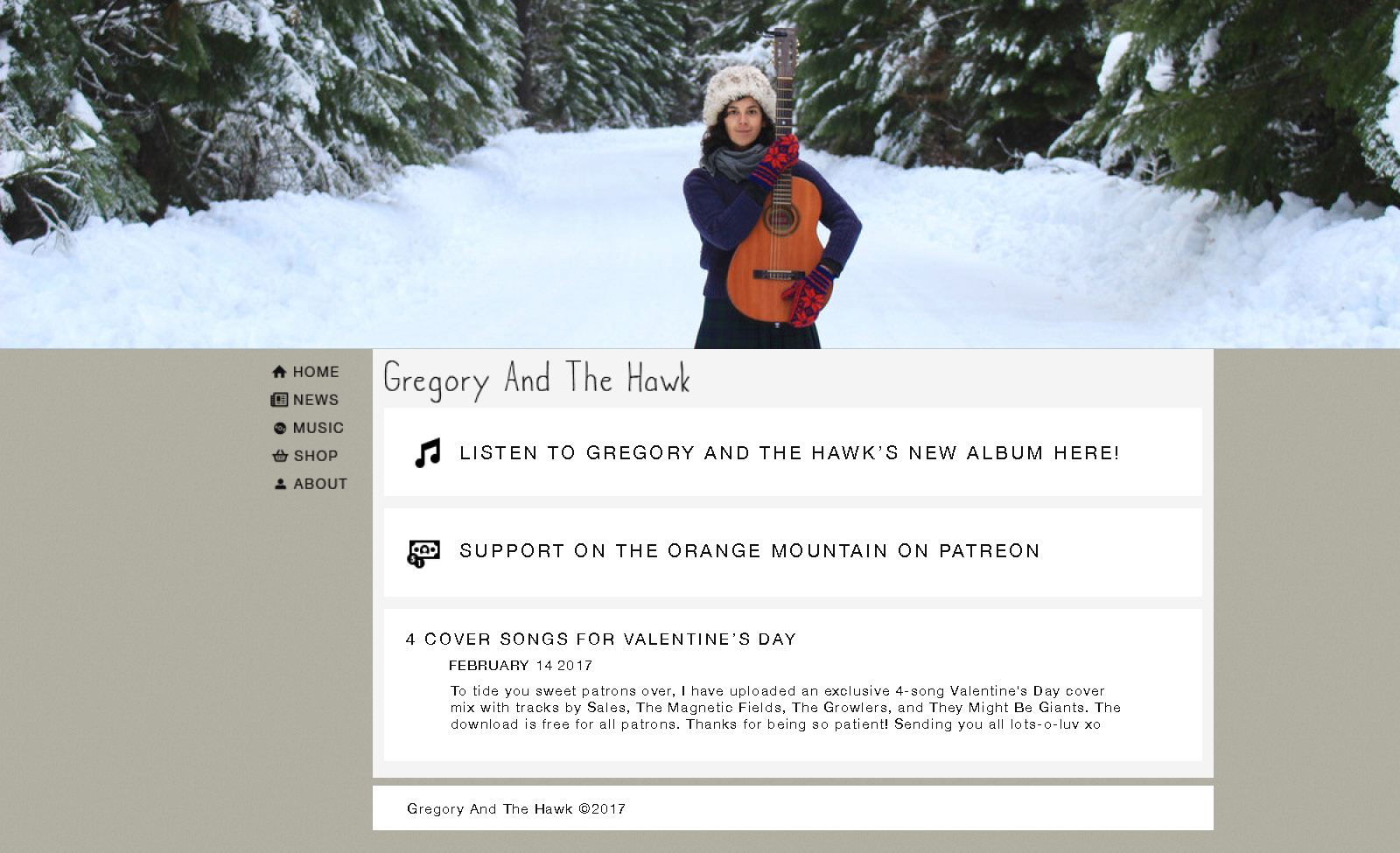 This is the home page design for the Gregory and the Hawk website. It features a header image, sidebar, and footer. The header image changes on every page, and this design features a photo of the artist standing in the snow with her guitar. The content of the page includes a link to listen to a preview of Gregory and the Hawk's upcoming album, a link to the Patreon, and the most recent article from the news page.