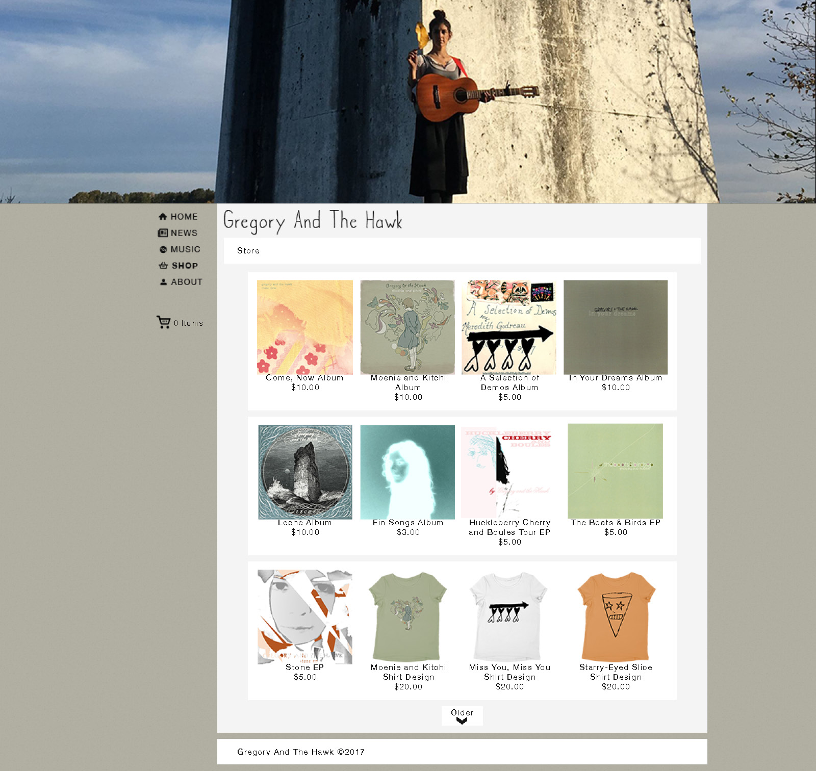 This is the store page for the Gregory and the Hawk website. It follows the same format as the home page. The header image on this page is a photo of the artist holding a leaf and her guitar, standing in front of a monument. The content of this page is sorted into defined rows of a grid. There are four columns in the grid. The items are blocks made up of an image and the title and price beneath it. There is a load more button that reads 'Older.'